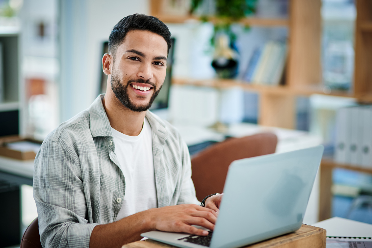 Shot of a young businessman working in his office