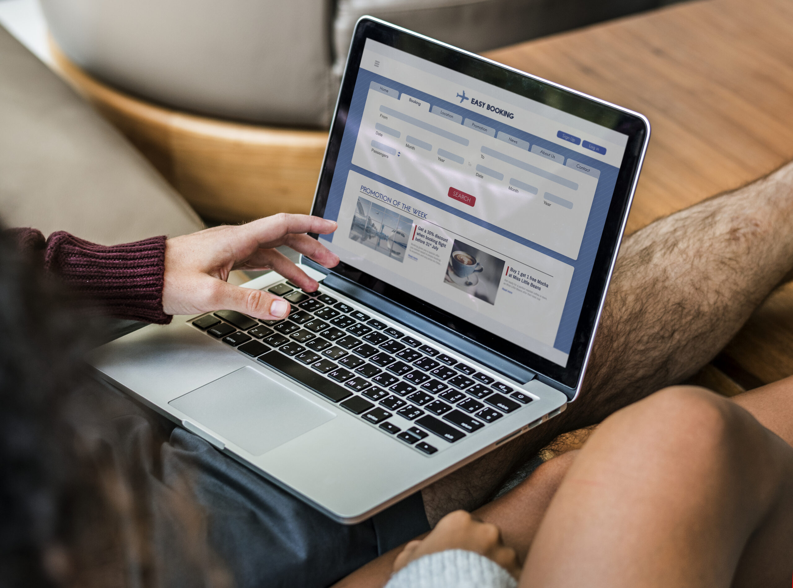 Couple using laptop together