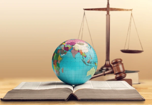 world-globe-wooden-gavel-law-600nw-2450643199
